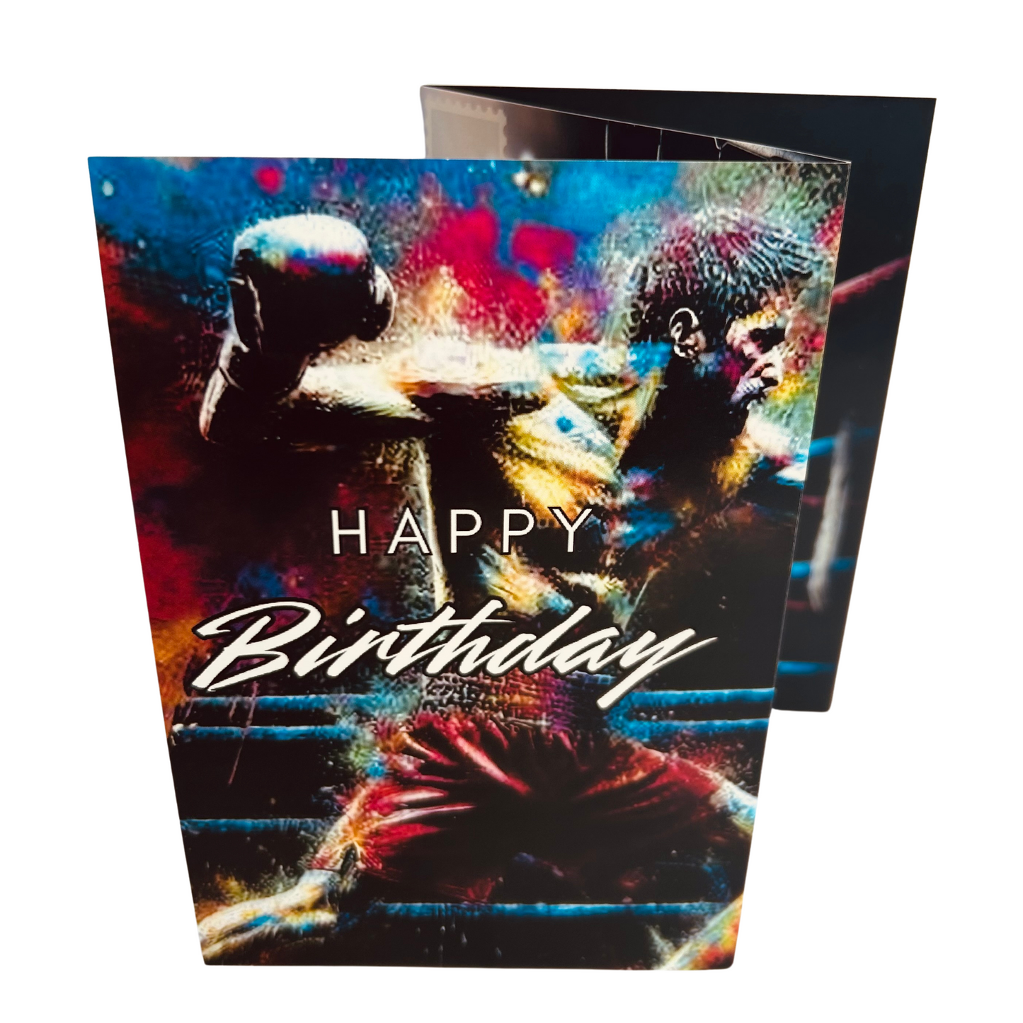 Trifold Male Boxng Birthday Card from the Push the Limit Range. Image shows the folded card depicting front with male boxer in red shorts drawing his right hand back ready for a punch and a background of colouful paint splatters. The caption reads 'Happy Birthday'.