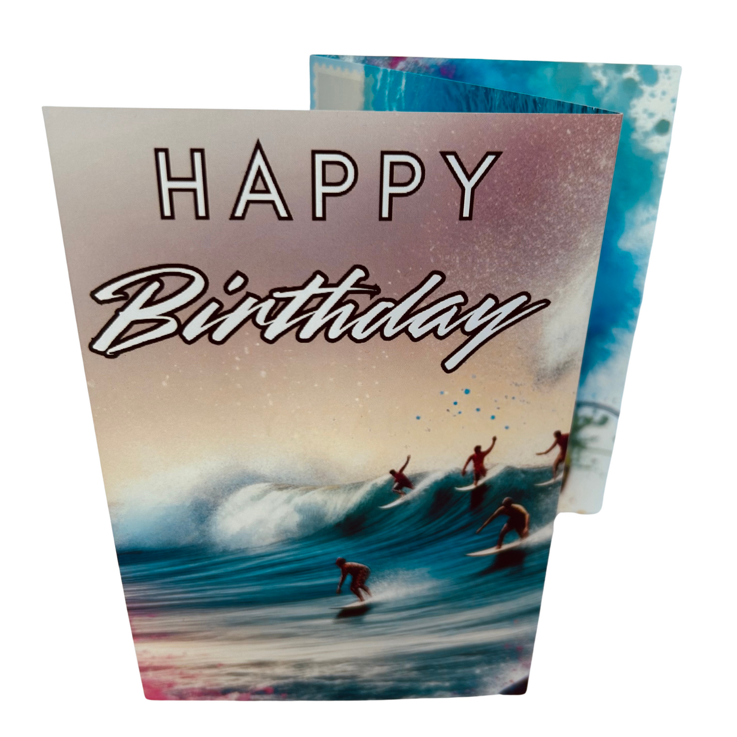 Trifold Male Surfing Birthday Card from the Push the Limit Range. Image shows the folded card depicting front with five surfers riding a large wave and a background of pink hazy sky. The caption reads 'Happy Birthday'.