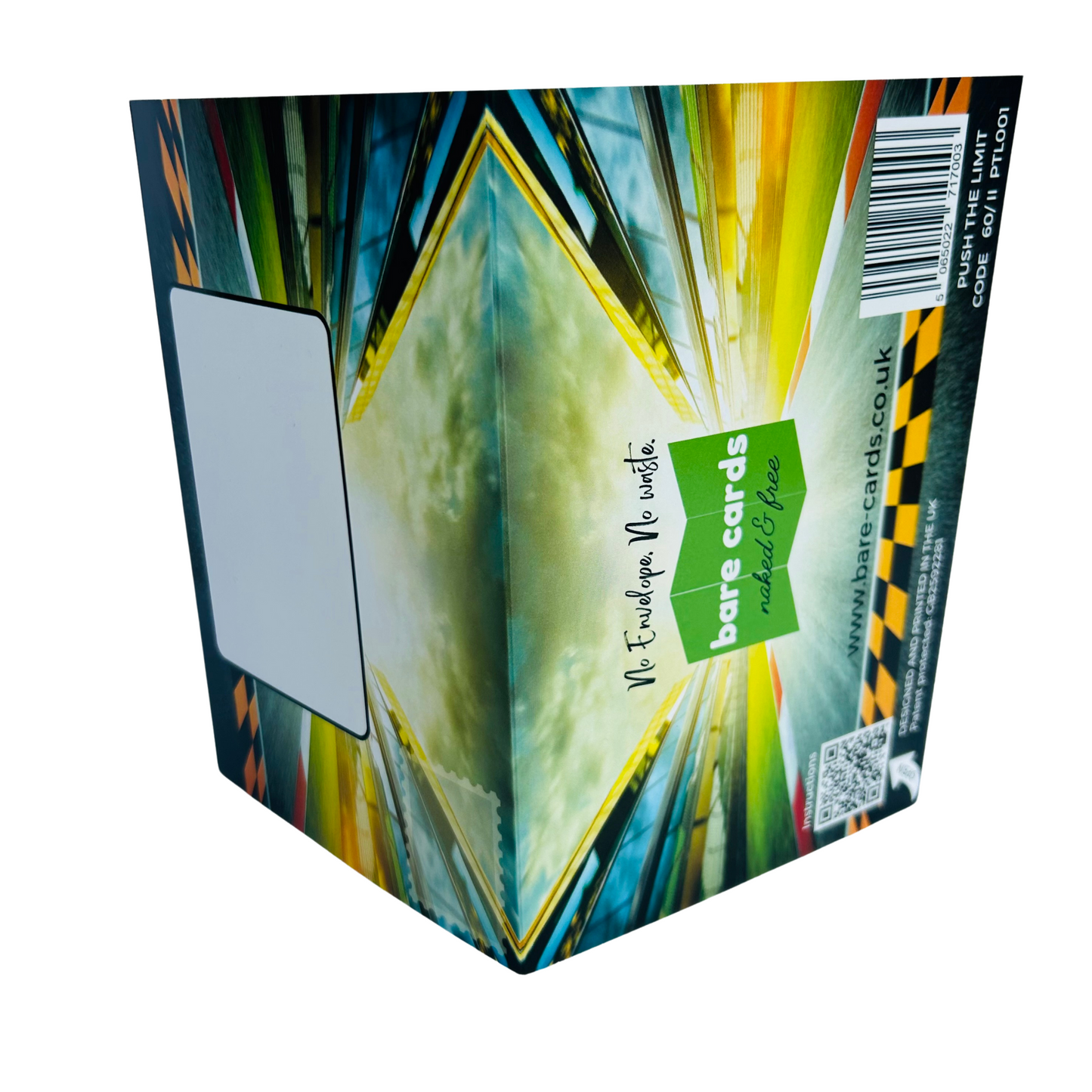 Trifold Grand Prix Birthday Card from the Push the Limit Range. Image shows the two posting covers. The front posting cover to the left shows an image of a Grand Prix track and has place to write the name and address of the recipient and an image to show where to put a stamp if needed. The back posting cover also shows the same image and has the Bare Cards logo and tagline 'Naked and Free'. It also contains the barcode, website address, QR code for instructions, Patent Number and Retail Codes