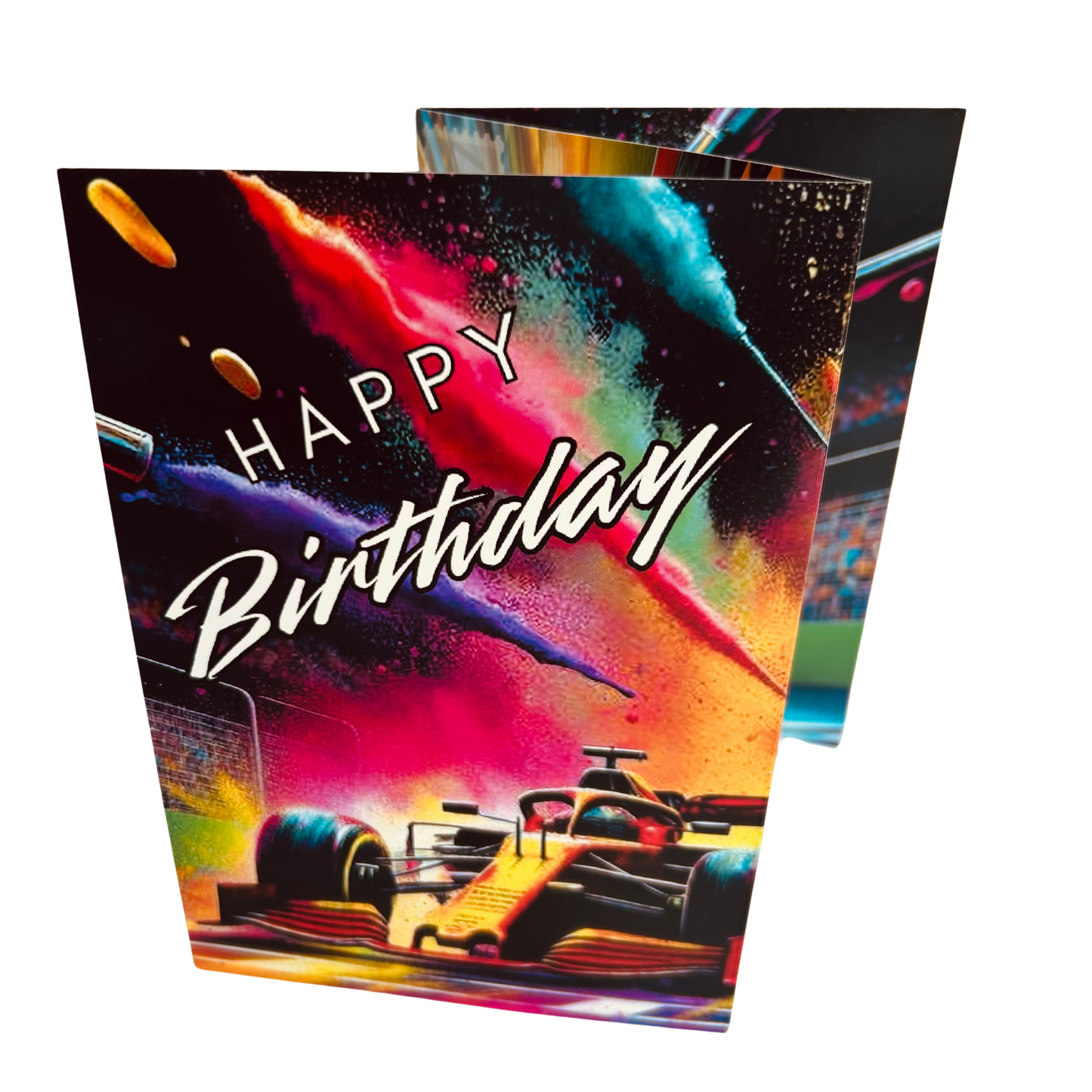 Trifold Racing Cars Birthday Card from the Push the Limit Range. Image shows the folded card depicting front with yellow Formula One racing car speeding to cross the finish line with colouful paint splatters emerging from the edges of the card and caption reads 'Happy Birthday'.