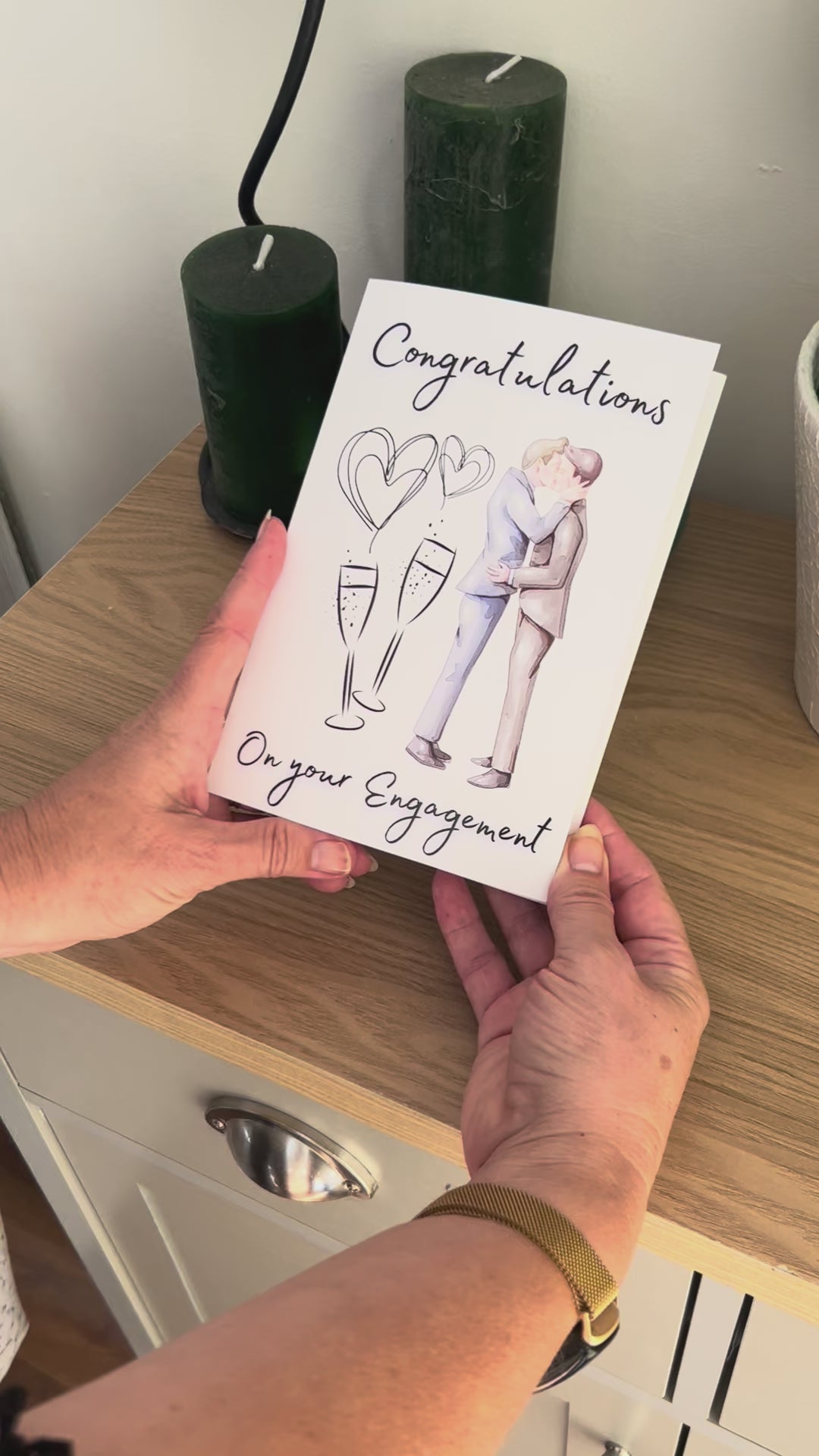 Video shows a demonstration of the Bare Cards Gay Engagement Card for men. Video shows how to fold and seal card to reveal built-in 'envelope'.