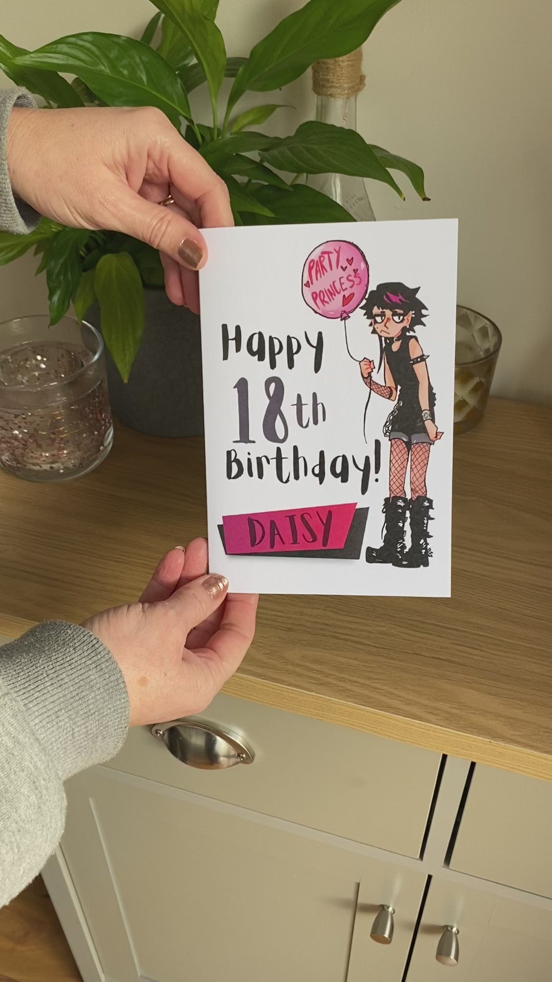 Video demonstrating the Bare Cards Birthday Card for our Goth Girl Personalised Age Range. This card is for a 18th Birthday with the personalisation 'Daisy' as an example. The video demonstrates how this unique card concept works by folding the third leaf around to create the posting page so there is no need for a separate envelope.