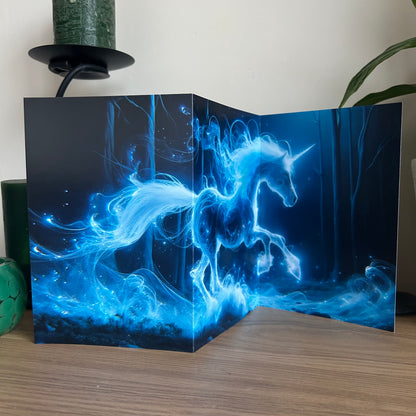 Blue glowing unicorn design on a black background