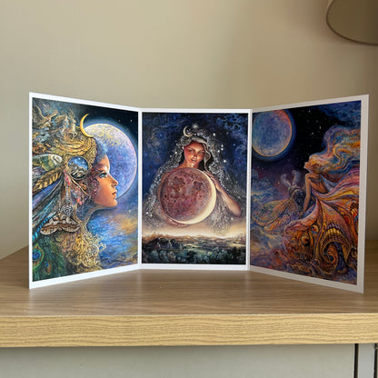 Three-panel self-sealing greetings card UK with artistic fantasy designs featuring Josephine Wall paintings of the moon goddess Diana and mystical moon paintings on a wooden surface