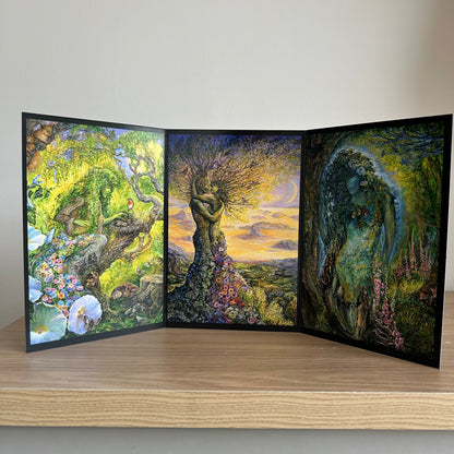 Three-panel self-sealing greetings card UK with artistic fantasy designs of nature figures on a wooden surface.