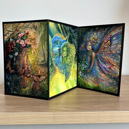 Triptych self-sealing greetings card featuring artwork with fairy and nature-themed designs on a wooden surface.