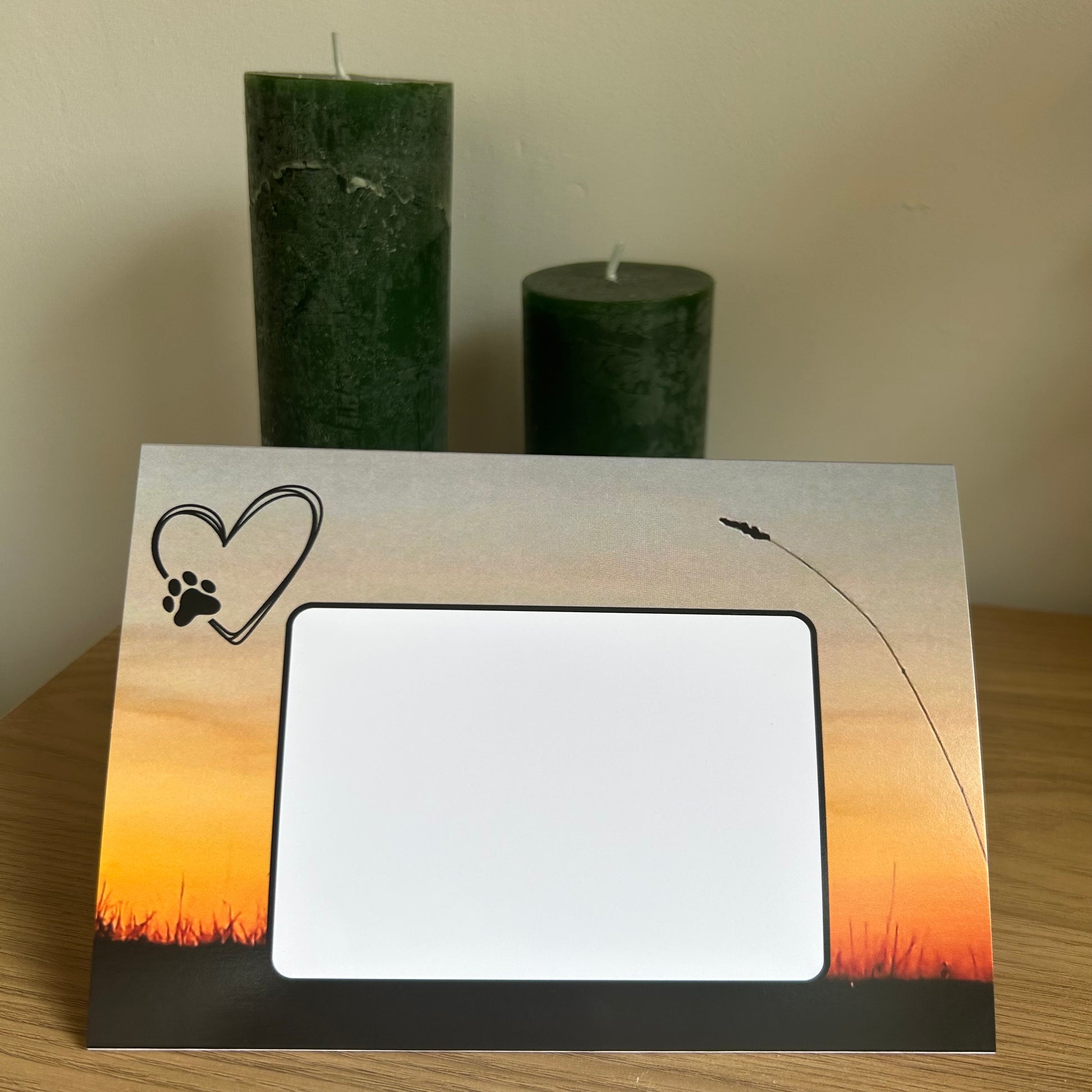 The image is a photo of the  front of the Bare Cards envelope pages for the Dependable Friends Trifold Photographic Dog Range depicting a silhouette of a field on a sunset background. 