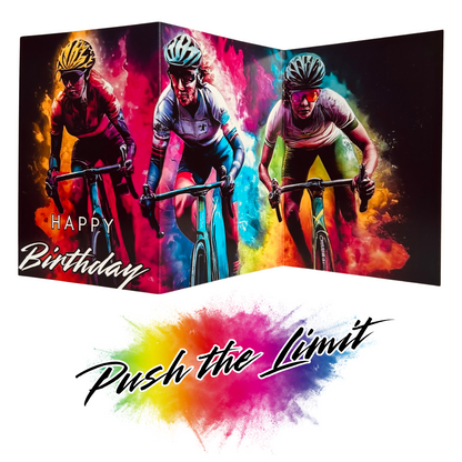 Main product image shows all three leaves of the trifold birthday card for Female Cycling. Card shows three women in multicoloured cycling gear and helmets racing against each other, all on a black background with an explosion of colourful paint splatters emerging from behind them. The caption on the card reads 'Happy Birthday'. Beneath this is the Push the Limit logo with the words displayed on a multicoloured paint splatter.