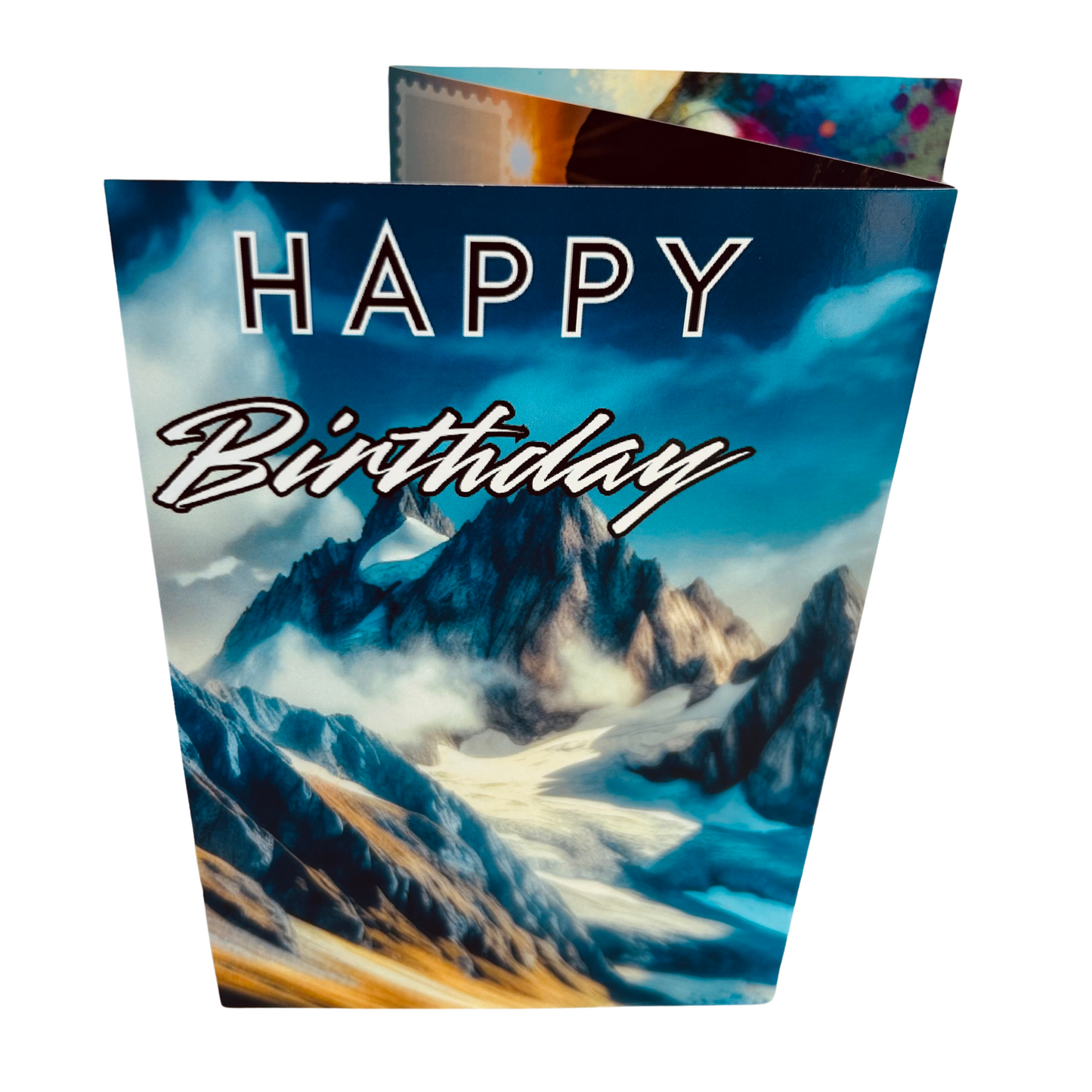 Trifold Female Rock Climbing Birthday Card from the Push the Limit Range. Image shows the folded card depicting front with mountainous range steeped in snow and clouds on a background of bright blue sky. The caption reads 'Happy Birthday'.