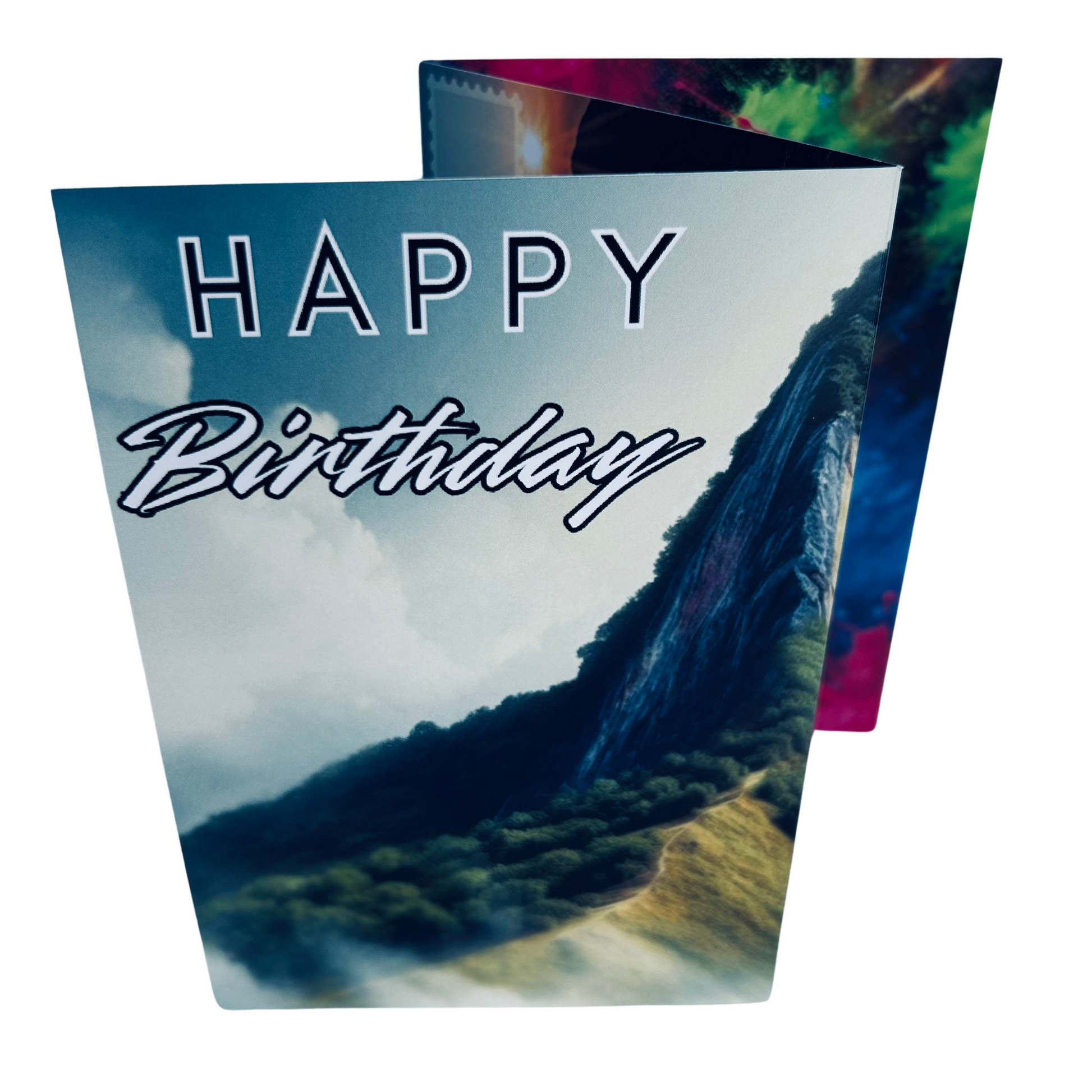 Trifold Male Rock Climbing Birthday Card from the Push the Limit Range. Image shows the folded card depicting front with high rock face on the side of a mountain, with trees and a path below. The caption reads 'Happy Birthday'.