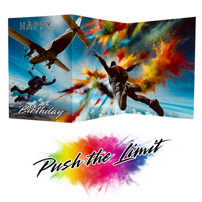 Main product image shows all three leaves of the trifold birthday card for Sky Diving. Card shows two sky divers who have just jumped out of a small biplane and who are free falling with arms outstretched, all on a blue sky background with explosions of colourful paint splatters emerging around them. The caption on the card reads 'Happy Birthday'. Beneath this is the Push the Limit logo with the words displayed on a multicoloured paint splatter.