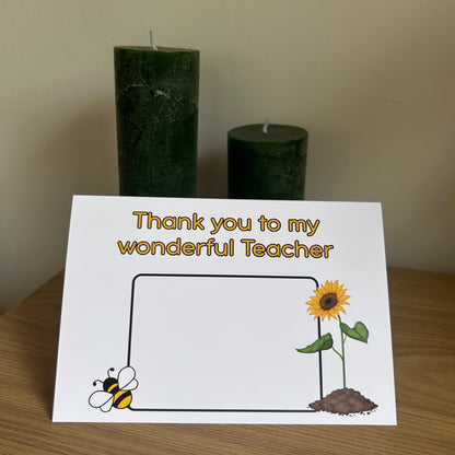 Bare Cards Thank you teacher card. Photo shows the front of the built in envelope pages with the caption 'Thank you to my wonderful teacher' on the front with a space to write teacher name and images of a sunflower and a bee. 