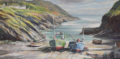 Portloe Harbor scene in Cornwall with fishing boats on a rocky shore and cliffs in the background