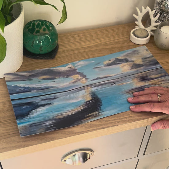 A demonstration video for the self-sealing greetings card 'Lake King' from the Sue O'Sullivan Art Collection. The video shows how to write, fold, seal, address, open and display this trifold card.