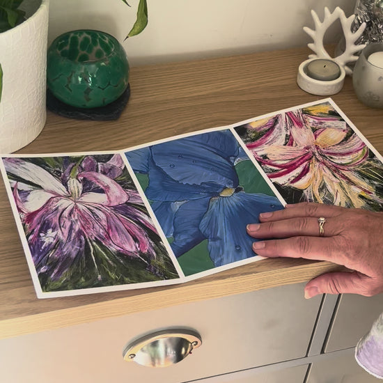 A demonstration video for the self-sealing greetings card 'Flowers' from the Sue O'Sullivan Art Collection. The video shows how to write, fold, seal, address, open and display this trifold card.