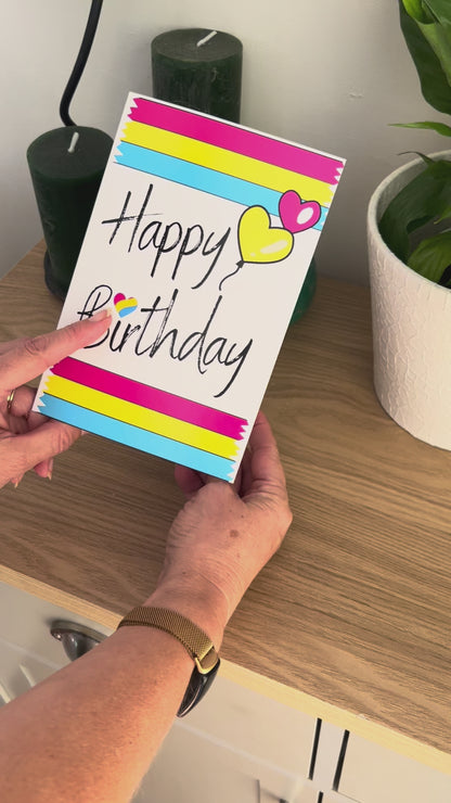 Video shows a demonstration of the Bare Cards Pansexual Birthday Card. Video shows how to fold and seal card to reveal built-in 'envelope' in Pride Flag colours.