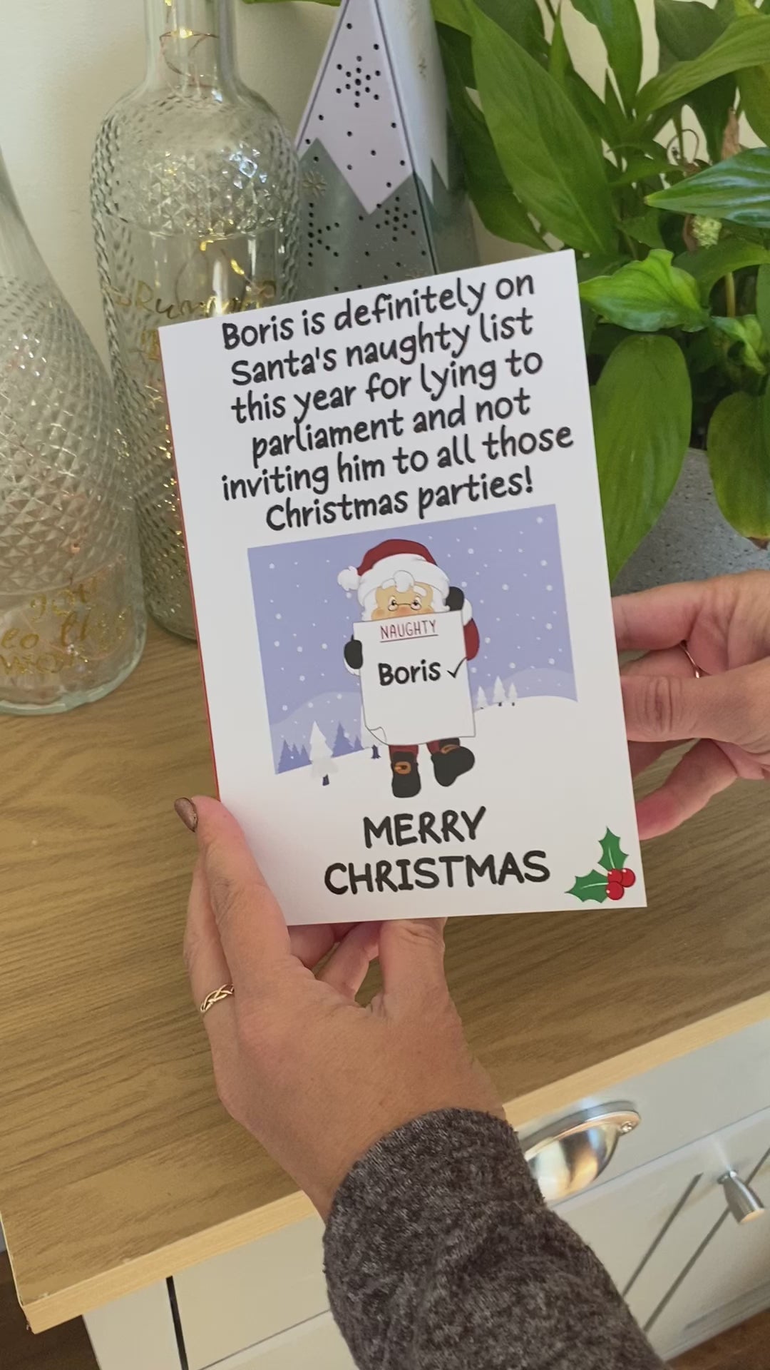 Video of Christmas Card featuring Boris and joke that he's on Santa's naughty list for not inviting him to Christmas Parties and lying to parliament.