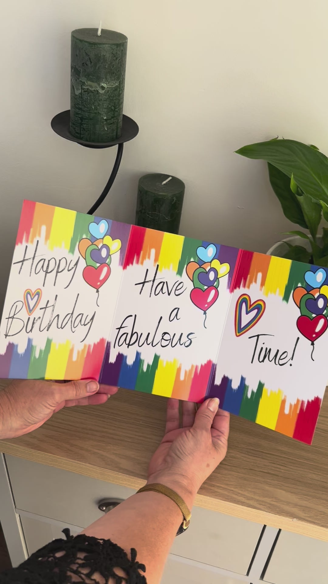 Video shows a demonstration of the Bare Cards Trifold LGBT Birthday Card. Video shows how to fold and seal card to reveal built-in 'envelope' in Pride Flag colours.