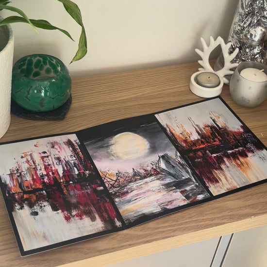 A demonstration video for the self-sealing greetings card 'Moonlit Henge' from the Sue O'Sullivan Art Collection. The video shows how to write, fold, seal, address, open and display this trifold card.