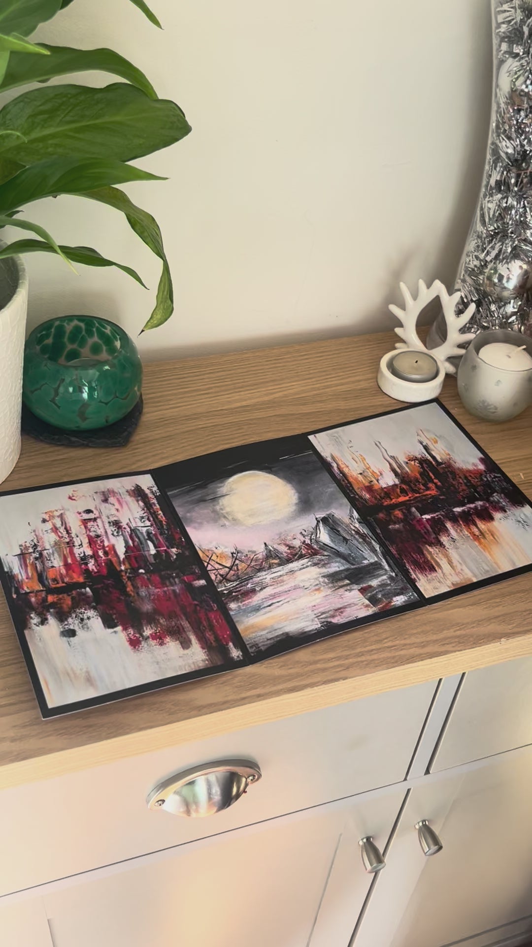 A demonstration video for the self-sealing greetings card 'Moonlit Henge' from the Sue O'Sullivan Art Collection. The video shows how to write, fold, seal, address, open and display this trifold card.