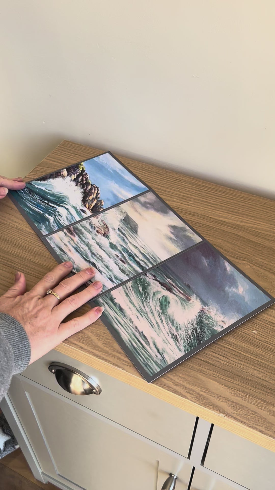 Video shows the self-sealing greetings card from Bare Cards from the John L Harris Collection - a trifold card showing triptych paintings of British Coastal Scenes  - A stiff south-westerly. The Video shows how to fold, seal and write your card.