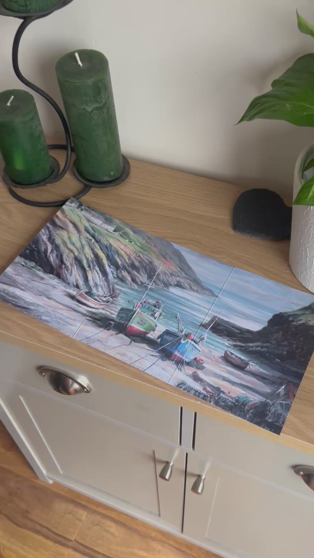 Video shows the self-sealing greetings card from Bare Cards from the John L Harris Collection - a trifold card showing a painting of a British Coastal Scene - Fishing Boats, Portloe. The Video shows how to fold, seal and write your card.